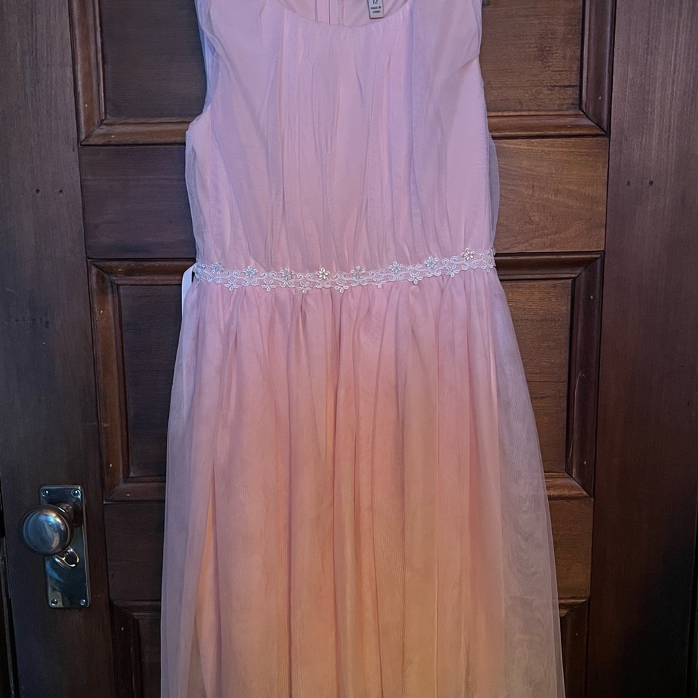 A beautiful soft pink special occasion dress by Speechless.